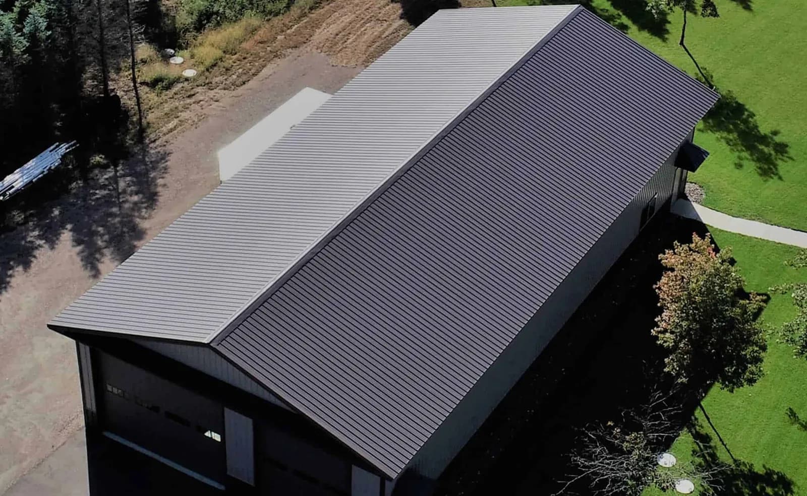 Pole building reroofing in progress