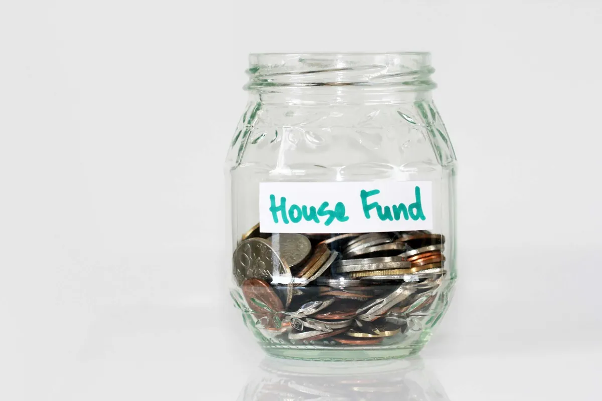 jar of coins for house fund