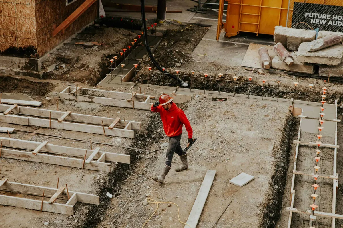 man walking on construction site